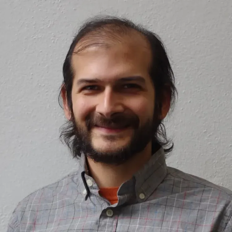 Headshot of Timothy Denherder-Thomas