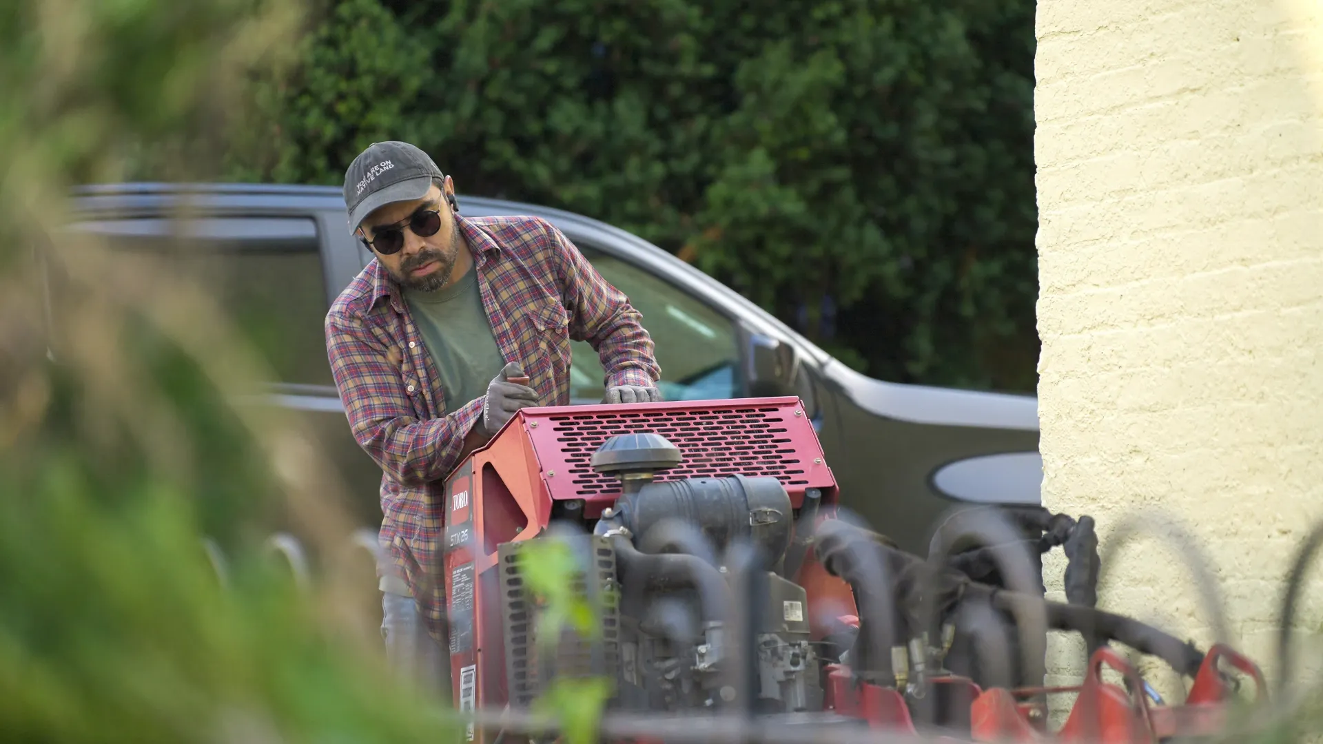 Landscaper pushing a cart